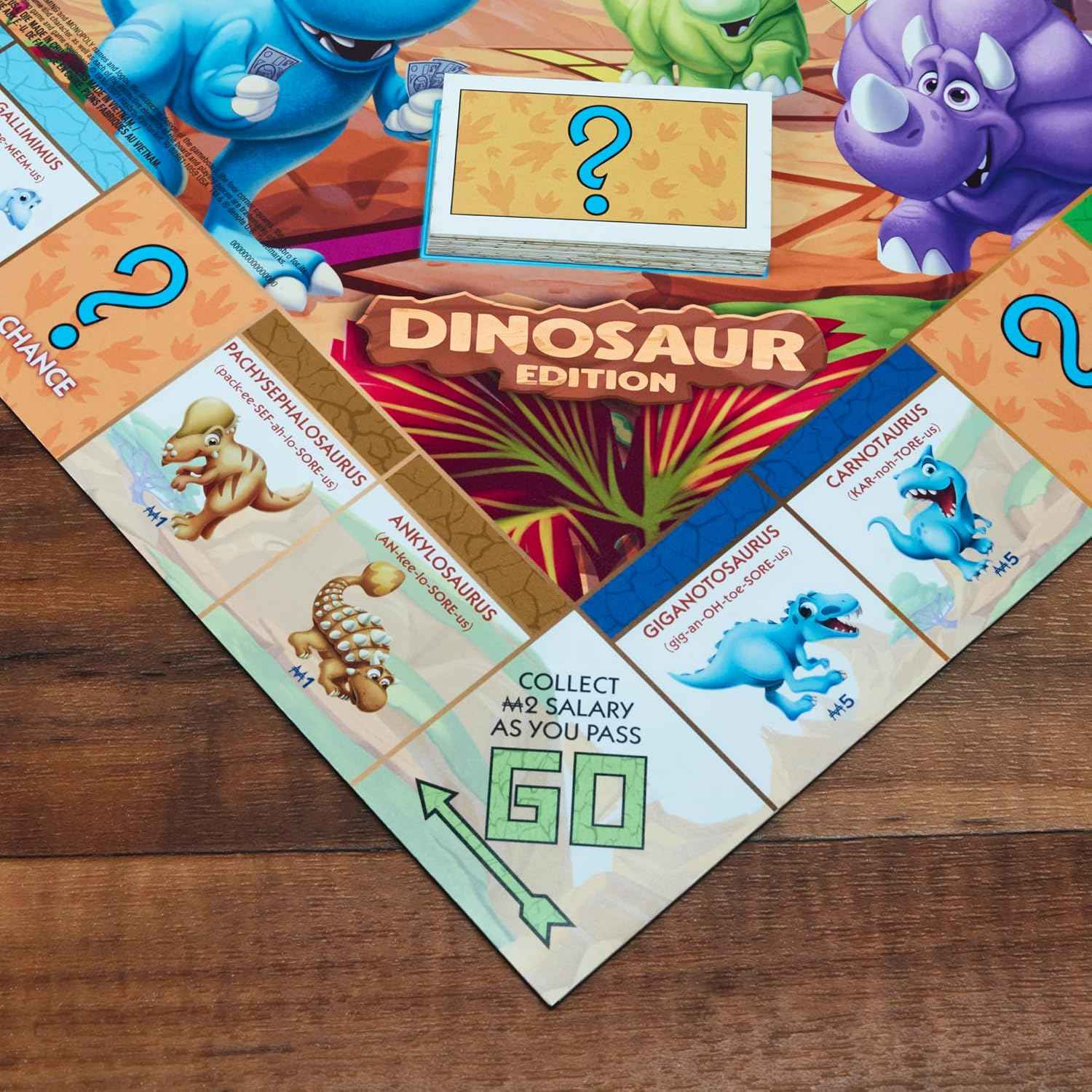 Monopoly Junior Dinosaur Edition Board Game for Kids Ages 5-8, Family Playroom Activity with 4 Dino Toy Tokens
