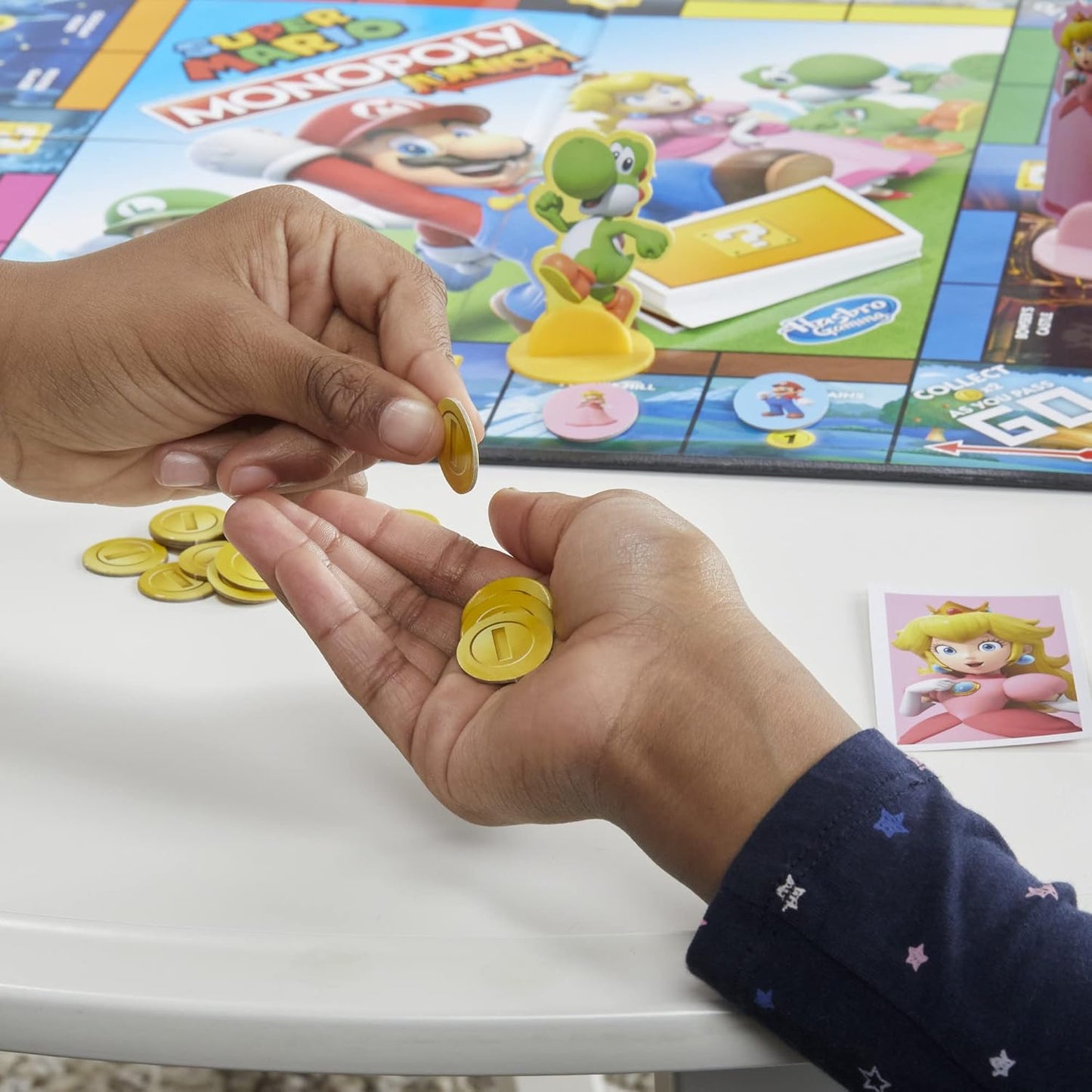 Monopoly_Junior_Super_Mario_Edition_Board_Game,_Fun_Kids'_Ages_5_and_Up,_Explore_The_Mushroom_Kingdom_as_Mario,_Peach,_Yoshi,_or_Luigi_(Amazon_Exclusive)