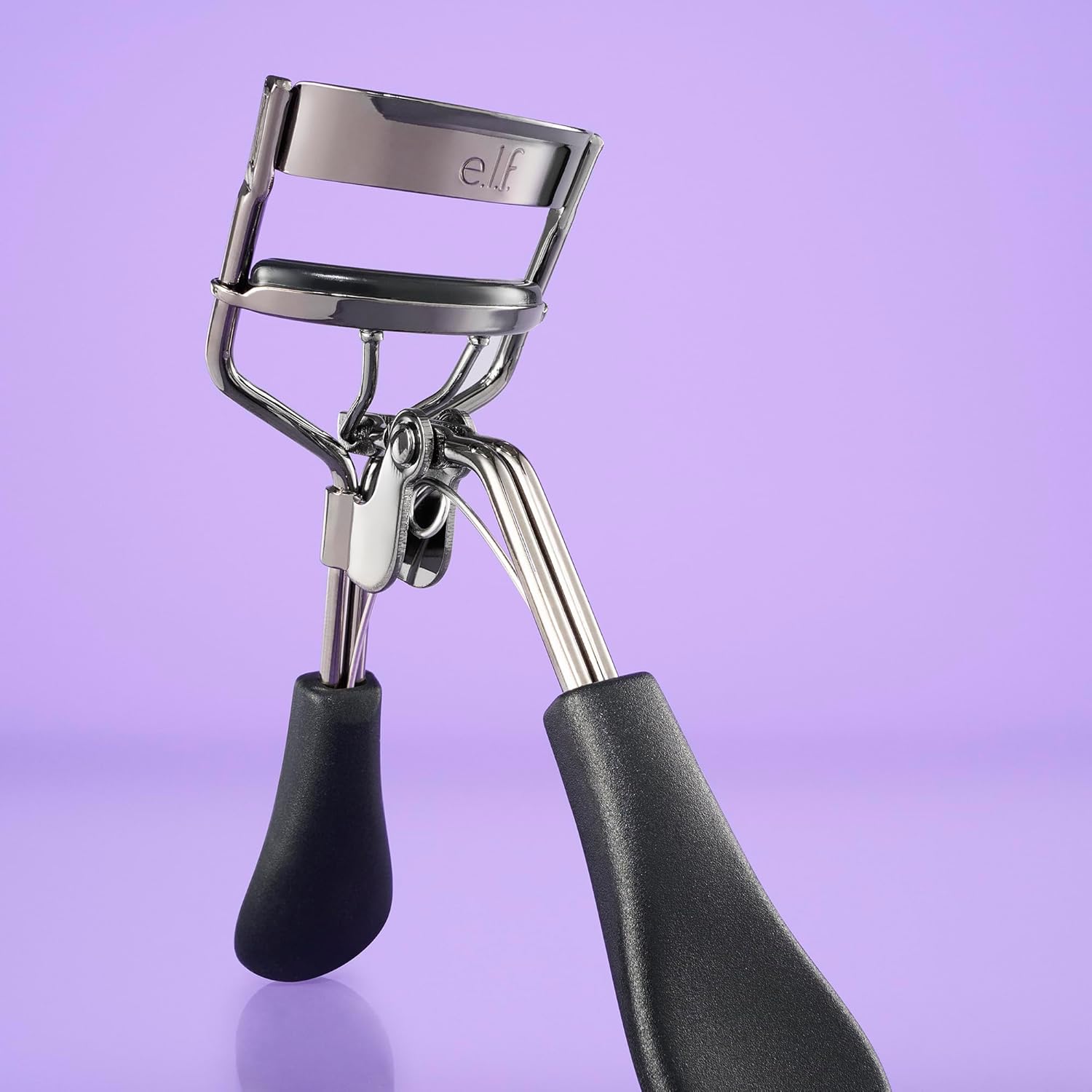 e.l.f._Pro_Eyelash_Curler,_Strong,_Contoured,_Eye-Opening,_Voluminous_Lashes,_Includes_Additional_Rubber_Replacement_Pad,_Silver