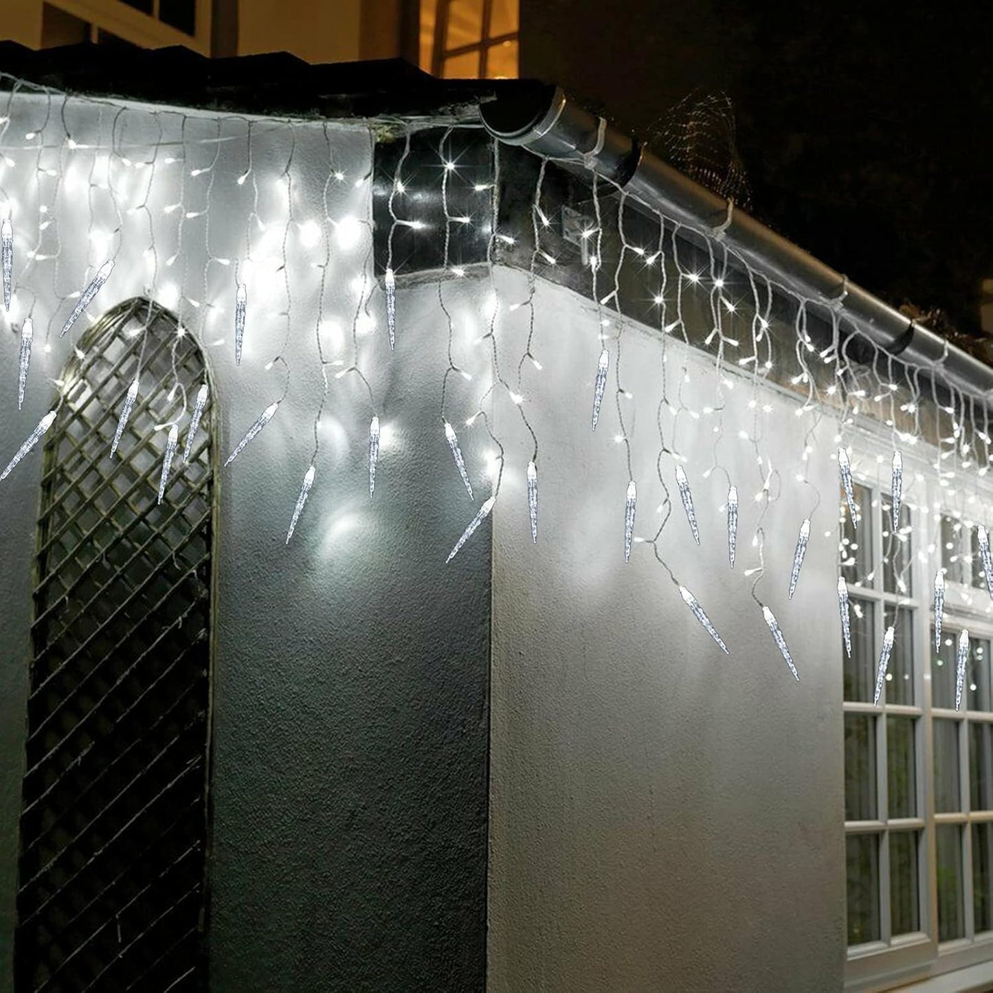 Icicle_Christmas_Lights,_29.5ft_360_LED_Connectable_Icicle_String_Lights_with_60_Drops,_Window_Curtain_Fairy_Light_with_8_Modes,_Christmas_Fairy_Twinkle_Light_for_Garden_Eaves_Xmas_Decorations_(White)