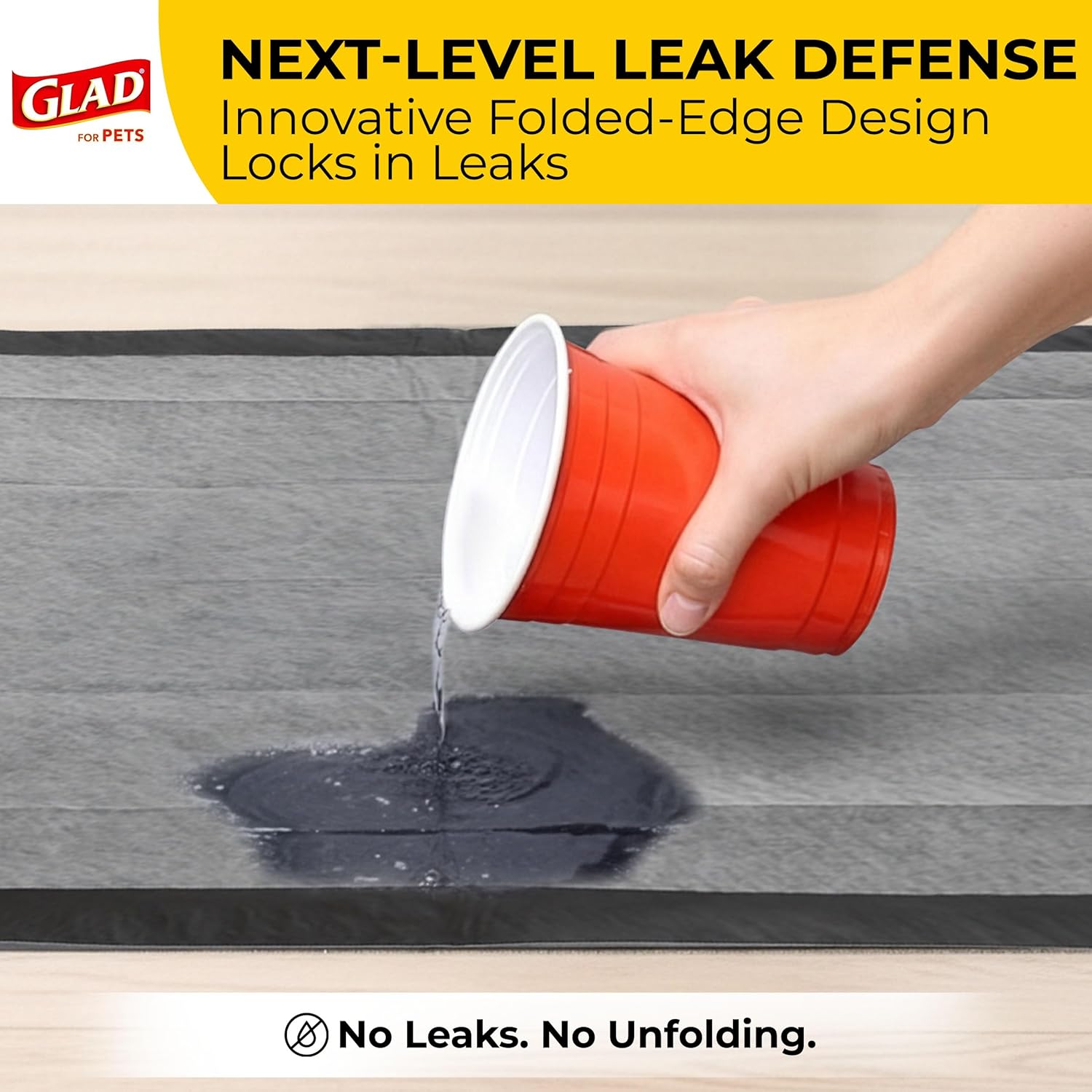 Glad_for_Pets_Black_Charcoal_Puppy_Pads_-_6-Layer_Leak-Proof_Construction,_Activated_Carbon_Odor_Control,_Pheromone_Attractant_-_Disposable_Dog_Pee_Pads_for_Potty_Training,_23_x_23_in,_100_Count