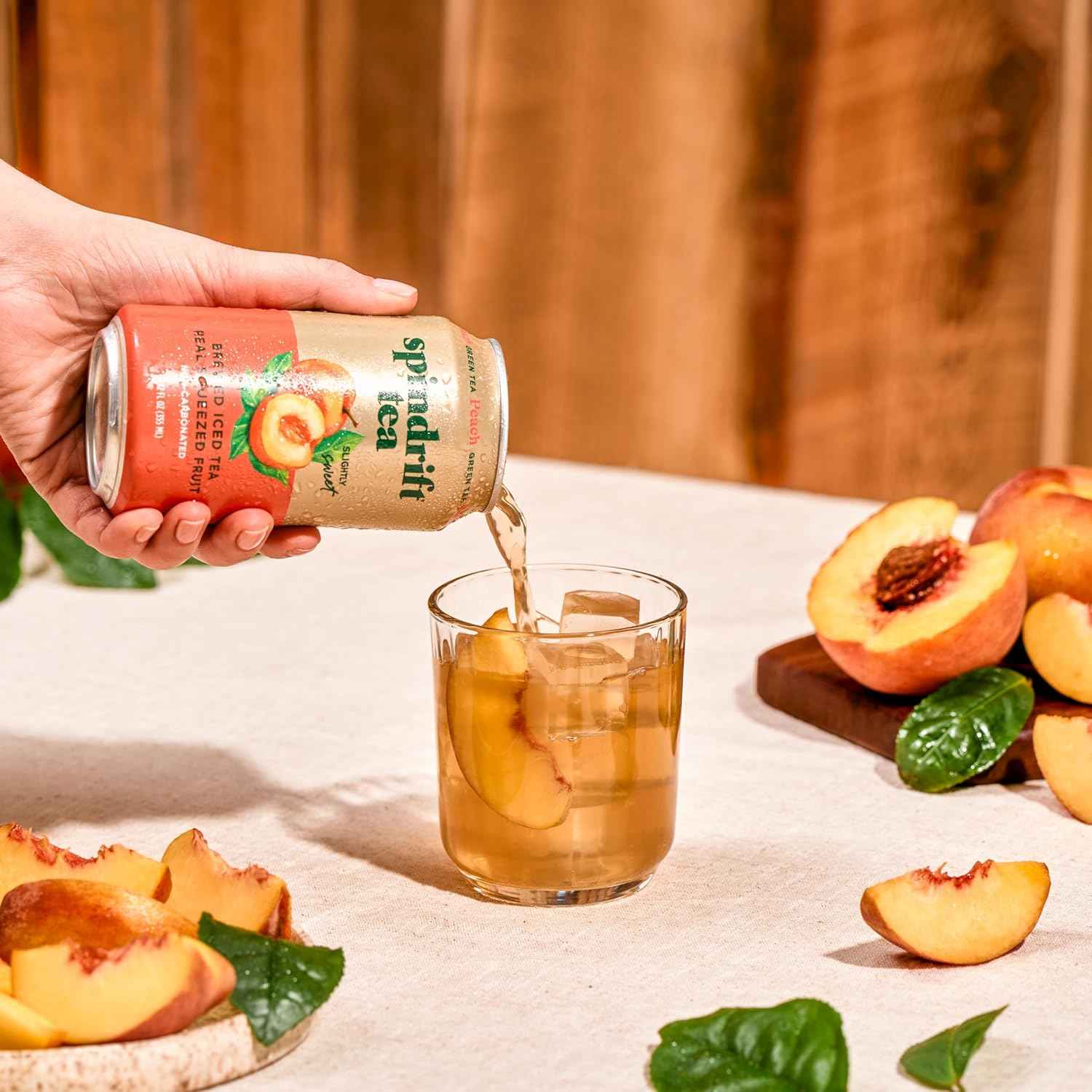 Spindrift Brewed Iced Tea, Made with Real Squeezed Fruit, No Carbonation, Slightly Sweet, 12 Fl Oz Cans