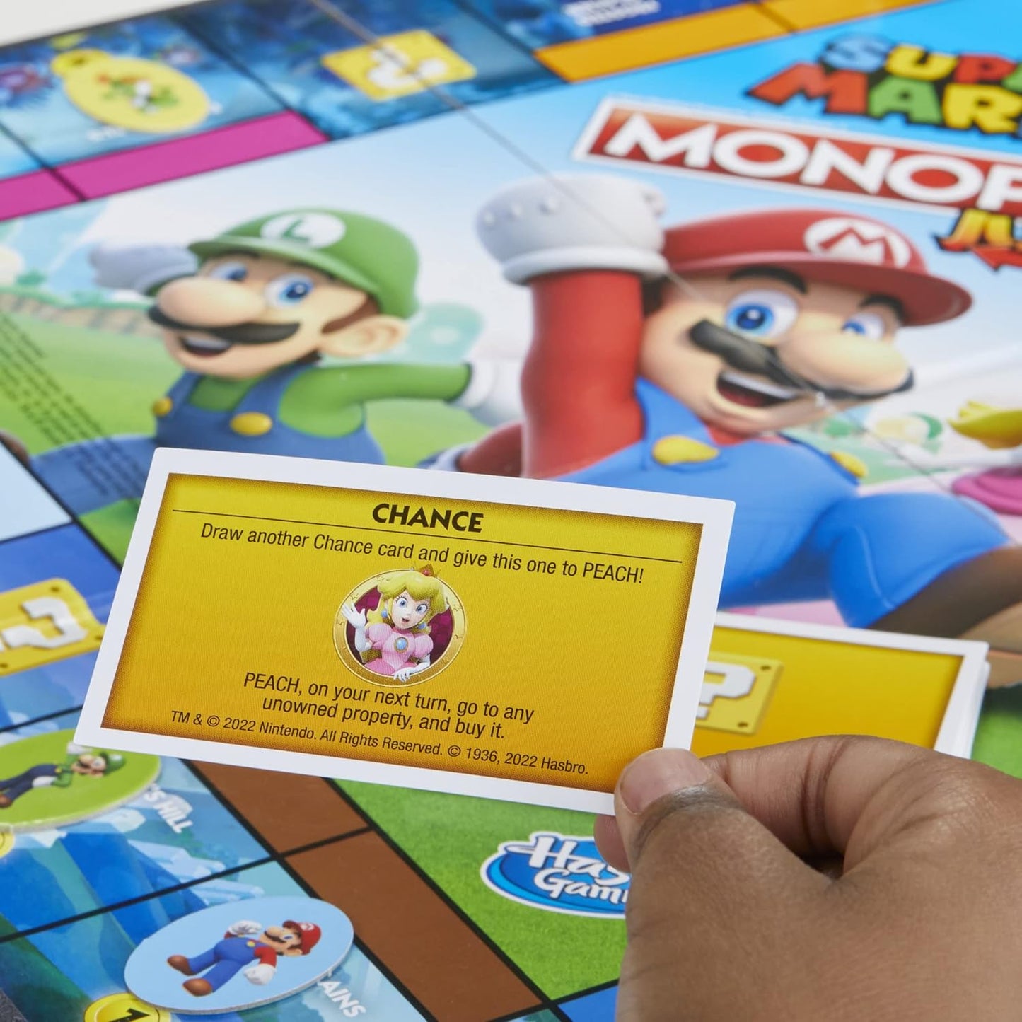 Monopoly_Junior_Super_Mario_Edition_Board_Game,_Fun_Kids'_Ages_5_and_Up,_Explore_The_Mushroom_Kingdom_as_Mario,_Peach,_Yoshi,_or_Luigi_(Amazon_Exclusive)
