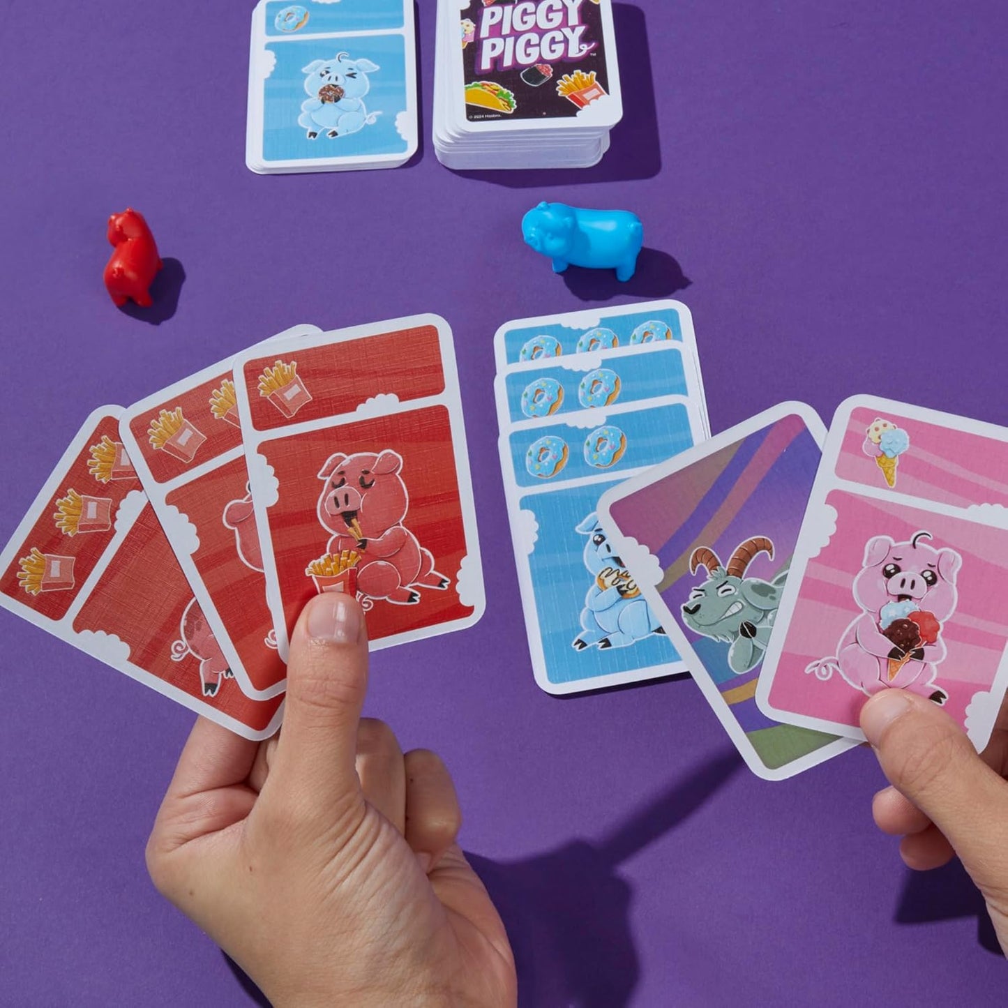 Hasbro_Gaming_Piggy_Piggy_Card_Game_|_Family_Games_for_Kids,_Teens,_and_Adults_|_2_to_6_Players_I_20_Mins._Average_|_Quick-Playing_Travel_Games_|_Fun_Summer_Activities_|_Vacation_Essentials_|_Ages_7+