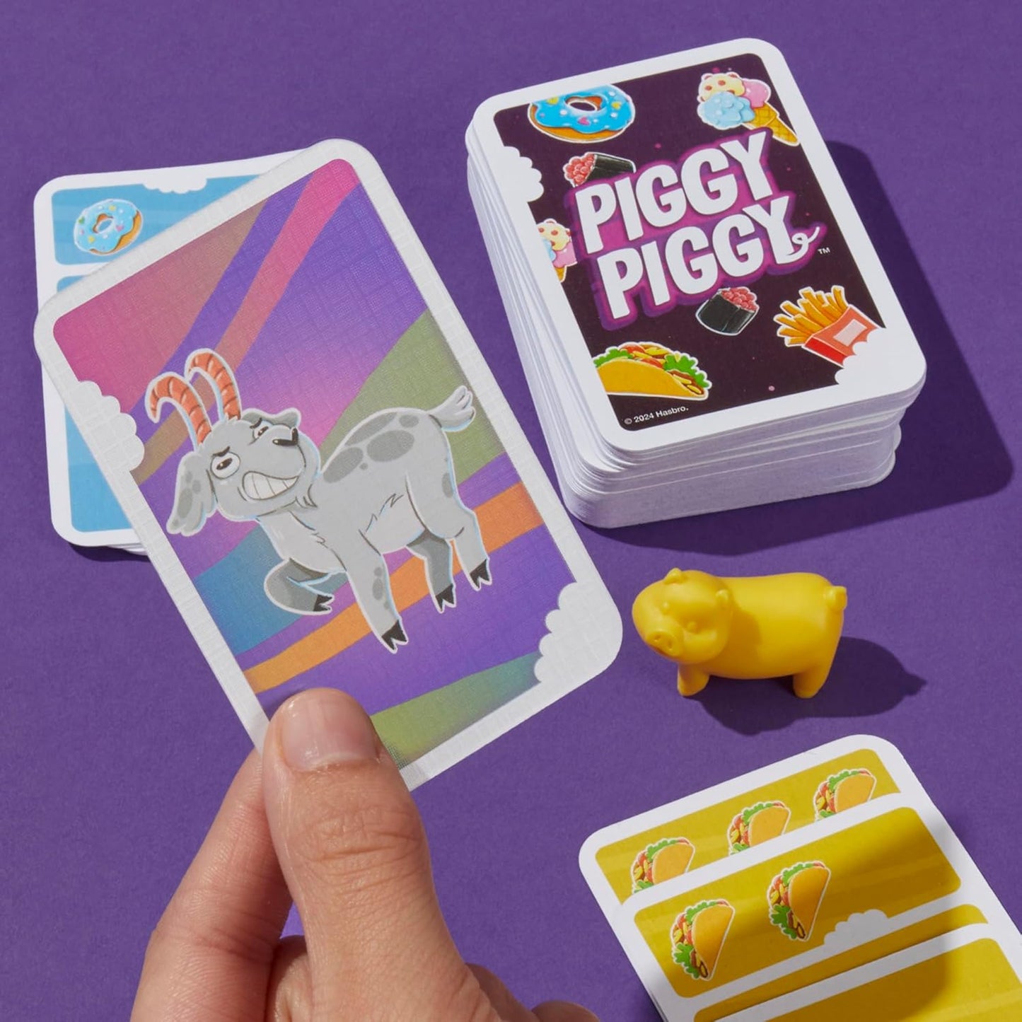 Hasbro_Gaming_Piggy_Piggy_Card_Game_|_Family_Games_for_Kids,_Teens,_and_Adults_|_2_to_6_Players_I_20_Mins._Average_|_Quick-Playing_Travel_Games_|_Fun_Summer_Activities_|_Vacation_Essentials_|_Ages_7+