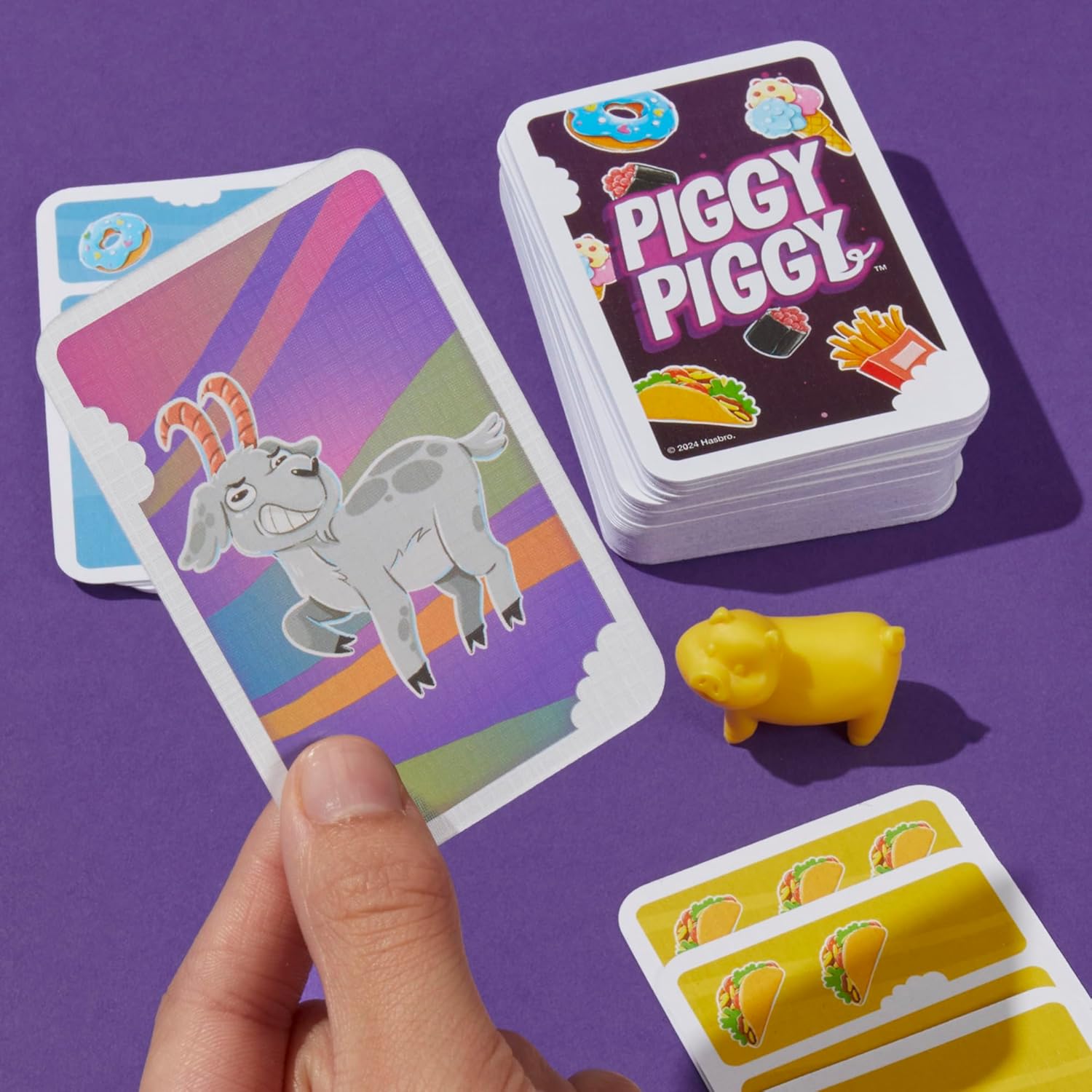 Hasbro_Gaming_Piggy_Piggy_Card_Game_|_Family_Games_for_Kids,_Teens,_and_Adults_|_2_to_6_Players_I_20_Mins._Average_|_Quick-Playing_Travel_Games_|_Fun_Summer_Activities_|_Vacation_Essentials_|_Ages_7+