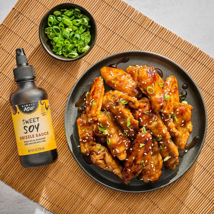 Simply_Asia_Drizzle_Sauce,_Sweet_Soy,_Savory,_Sweet_Sauce_for_Drizzling_on_Rice_Bowls,_Sticky_Rice,_Chicken_Skewers,_Sashimi,_Spring_Rolls,_Egg_Rolls,_Sushi,_Stir-Fry,_and_More,_8_fl_oz