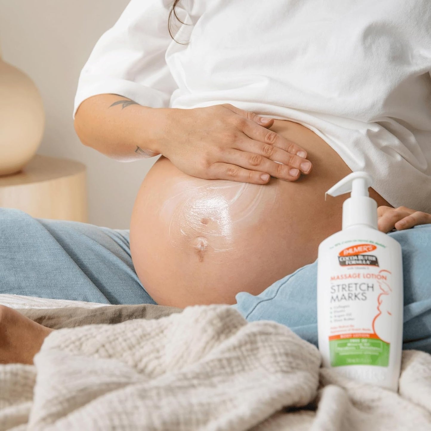 Palmer's_Cocoa_Butter_Formula_Massage_Lotion_For_Stretch_Marks,_Pregnancy_Skin_Care,_Belly_Cream_with_Collagen,_Argan_OIl_and_Shea_Butter,_8.5_Ounces