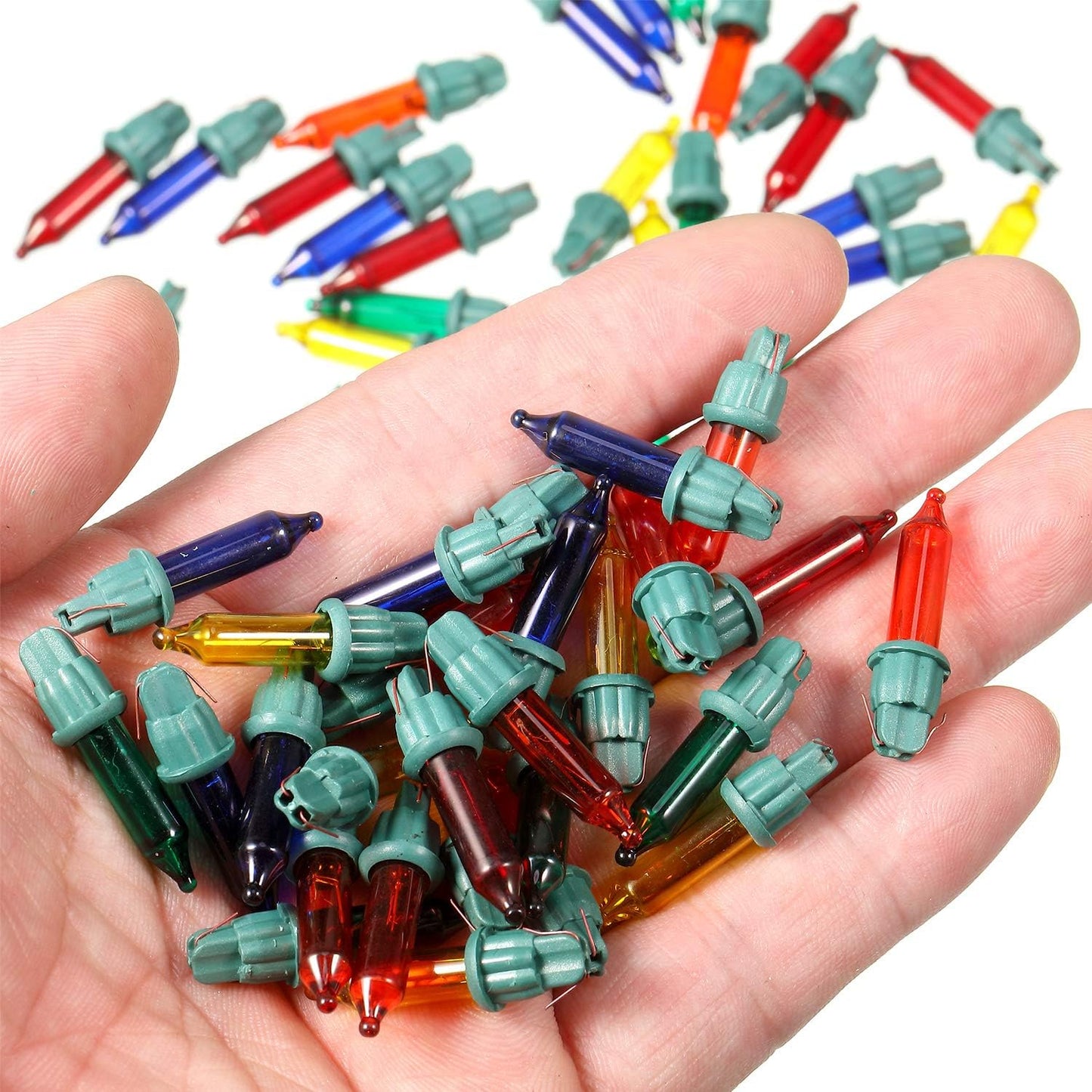 eight sku variants combining different base colors (green, white, black, brown) with bulb colors (warm white, multicolor, orange, black) including dedicated halloween options