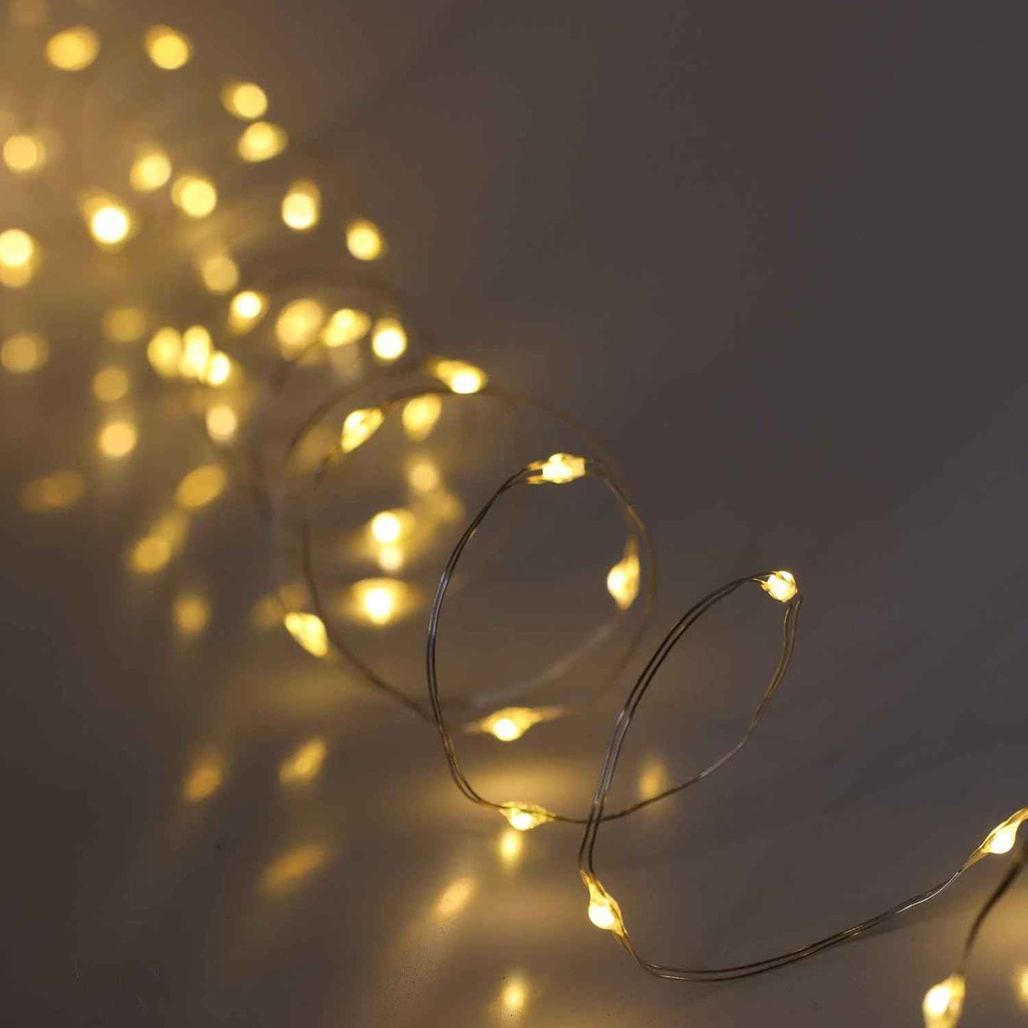 QBIS Warm White Fairy Lights – Battery Operated 6.5ft Silver Wire for Cozy Bedroom Shelf and Headboard Accent Lighting